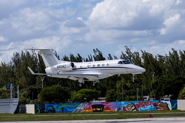 Embraer Phenom 300 N301AZ on October 24, 2026