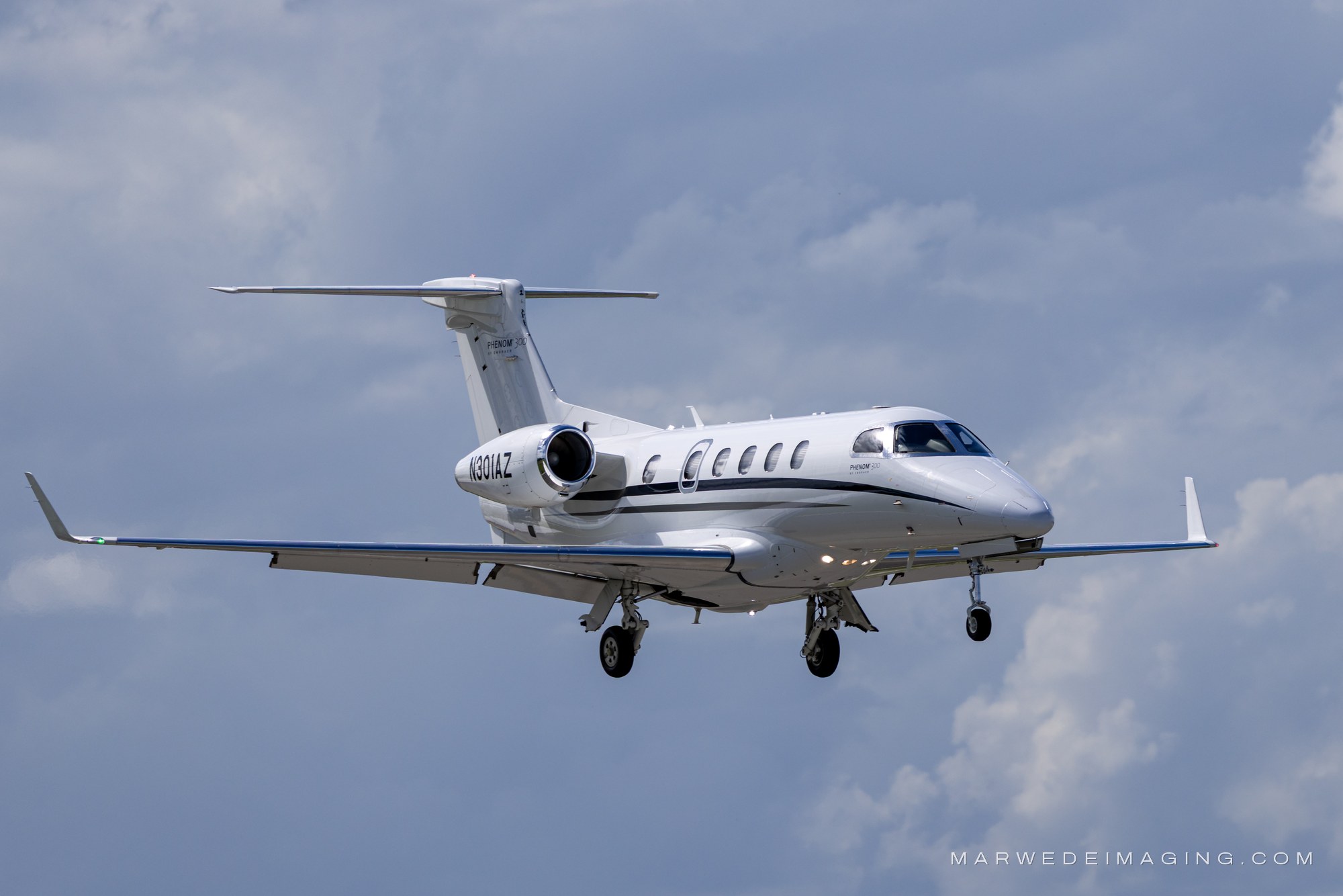 Embraer Phenom 300 N301AZ photographed at Boca Raton Airport (KBCT) on October 24, 2026