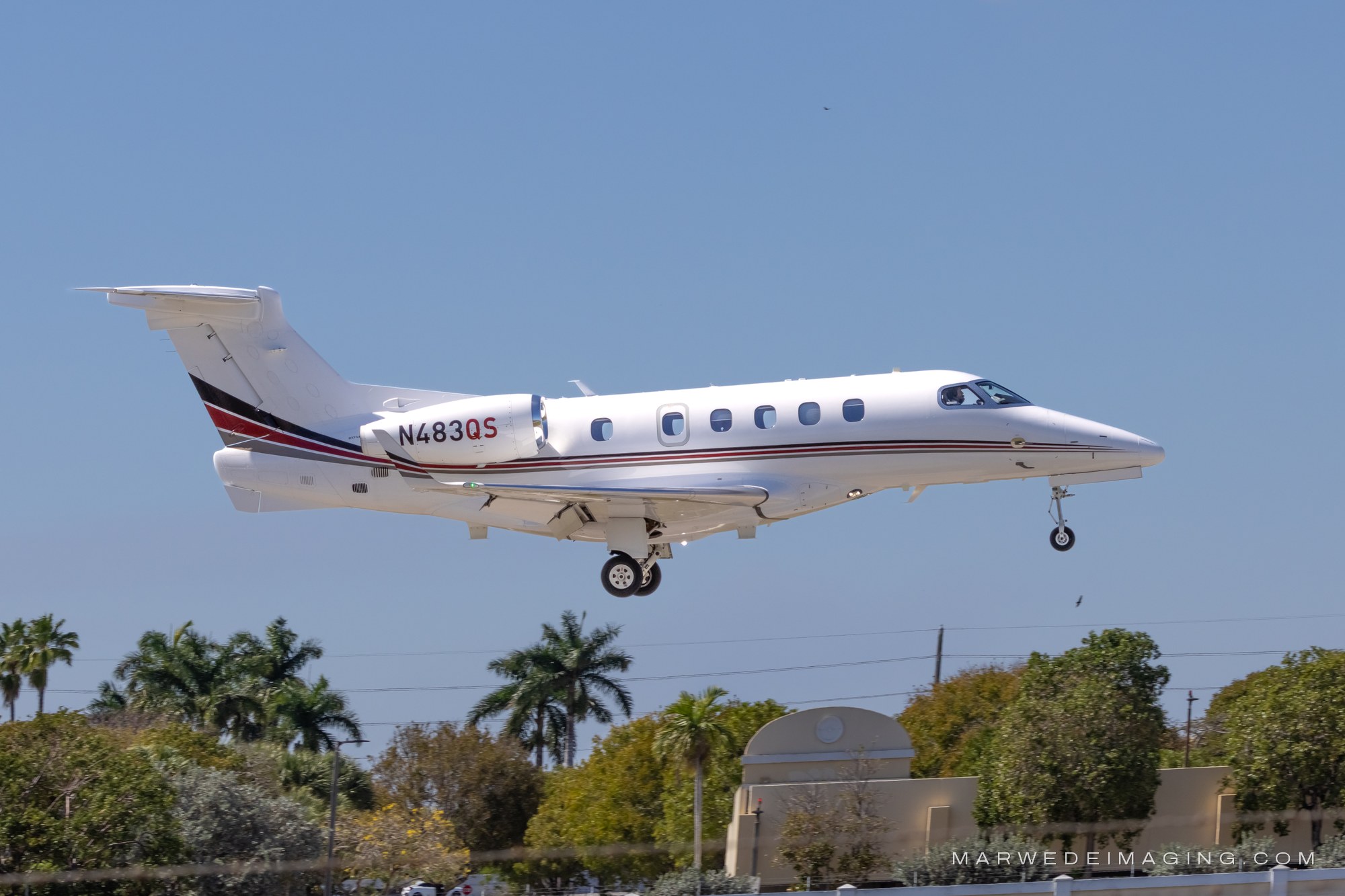 Embraer Phenom 300 N483QS photographed at Boca Raton Airport (KBCT) on March 22, 2026