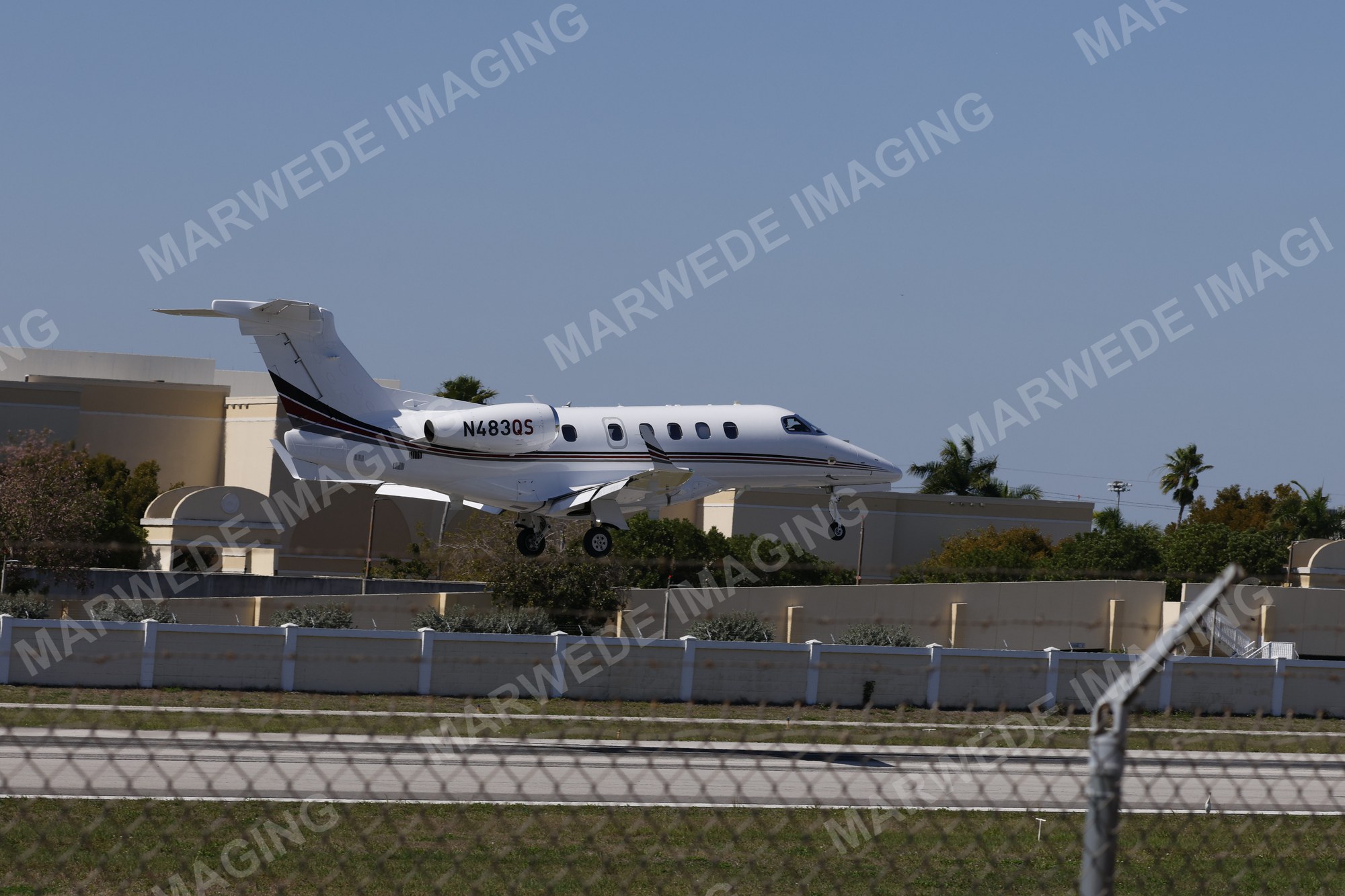 Embraer Phenom 300 N483QS photographed at KBCT on 2026-03-22