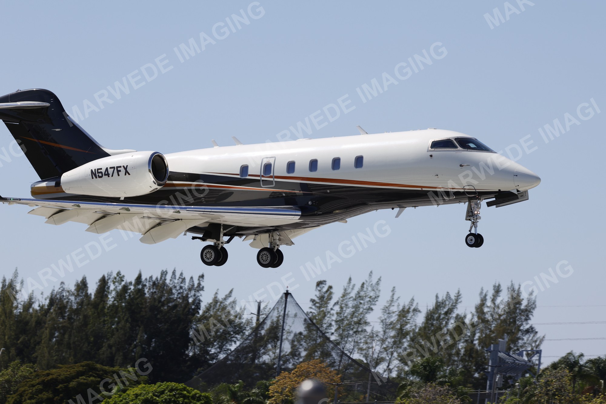 Bombardier Challenger 350 N547FX photographed at KBCT on 2026-03-22
